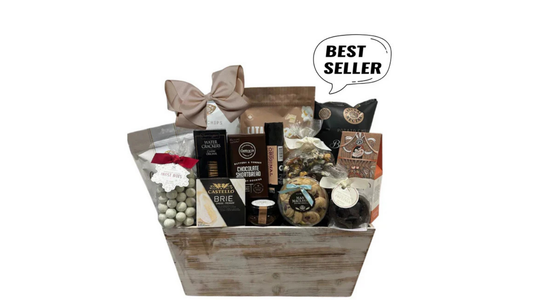 Luxury Academy Awards Indulgence Basket featuring Oscar-worthy Eatable popcorn, truffle chips, Trufino chocolates, artisanal salami, brie cheese, fig and walnut spread, gourmet cookies, and chocolate treats elegantly packaged by Unpredictable Gifts