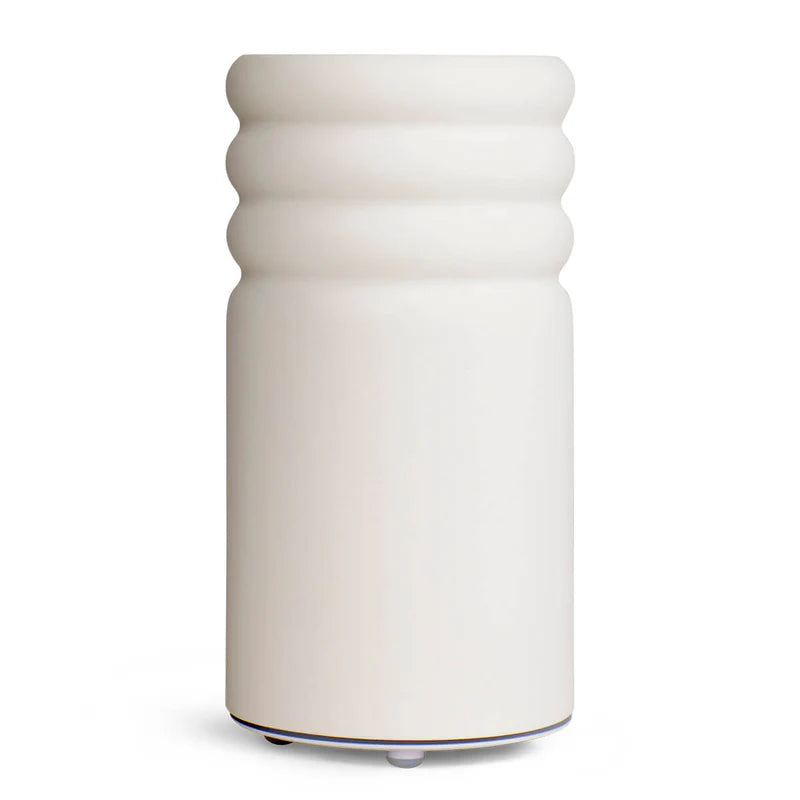 Saje Aroma Pulse Ceramic Diffuser - White modern ceramic essential oil diffuser with ultrasonic technology for aromatherapy and home wellness | Unpredictable Gifts