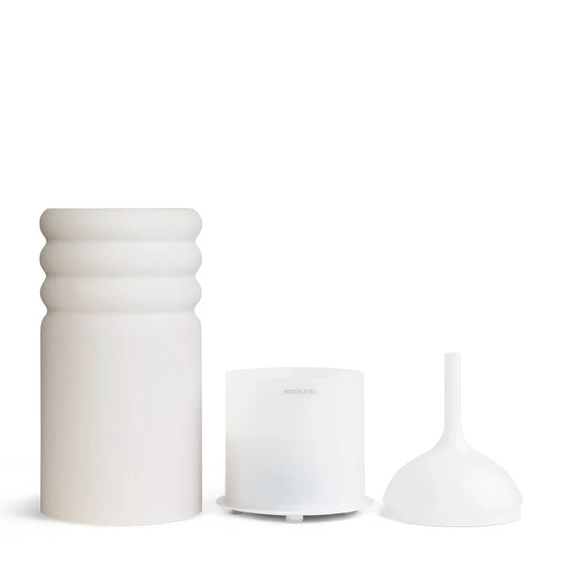 Saje Aroma Pulse Ceramic Diffuser - White modern ceramic essential oil diffuser with ultrasonic technology for aromatherapy and home wellness | Unpredictable Gifts